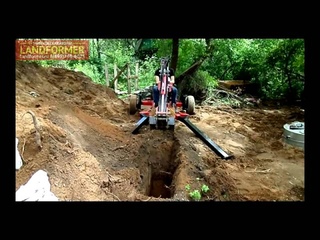 Мини экскаватор прицепного типа Landformer 100 российского производства