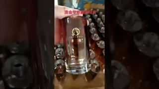 Roller stamping machine for hot stamping glass bottles