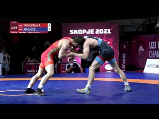 BRONZE GR - 63 kg: R. TAVMURZAEV (RUS) v. L. ABULADZE (GEO)