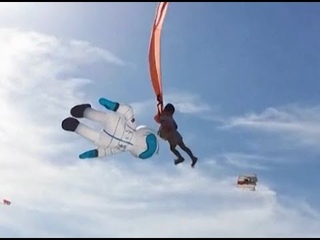 Kite swings child into the air at Taiwan festival