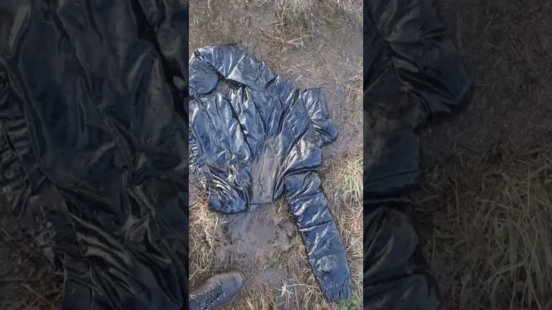 Shiny DKNY down jacket mudded in