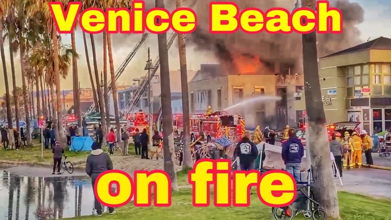 Homeless encampment fire burns down a two story